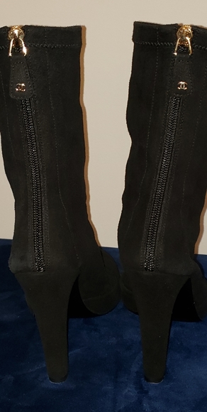 Chanel boots. They run small. I would say this is a better fit for size 6. - Picture 5 of 8